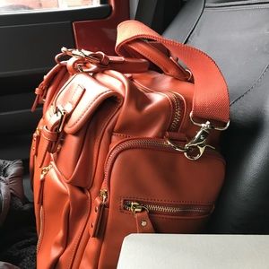 House of Flynn Evermore large orange camera bag. Used it once.